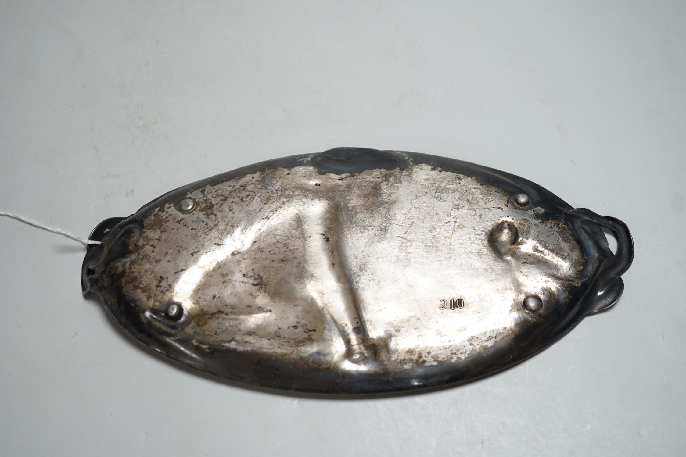 An unmarked, (possibly WMF) stamped 210 on base, an Art Nouveau pewter dish with a child admiring a snail. 27cm wide